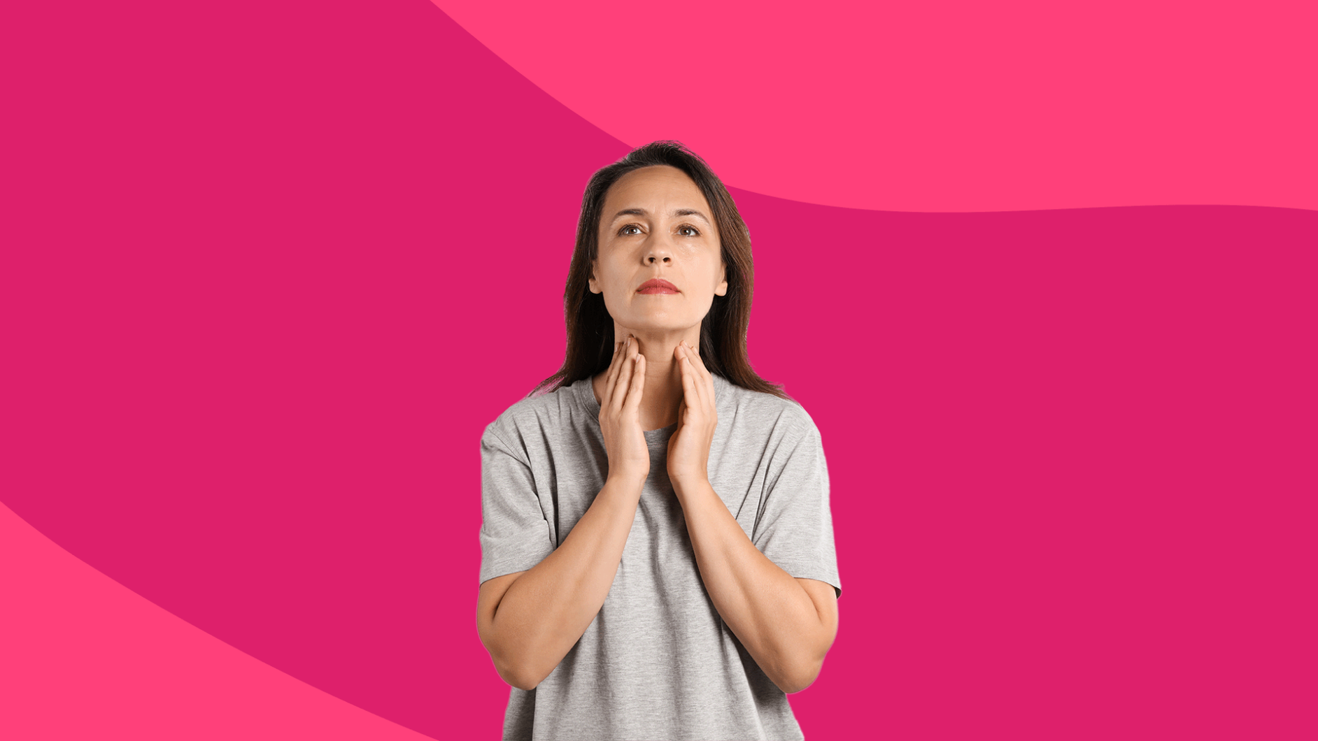 Woman with her hands on her neck touching her thyroid gland: Nmedies for hypothyroidism