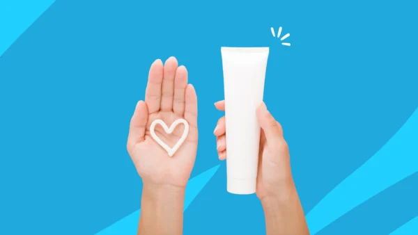 hands holding a tube of cream - triamcinolone for eczema