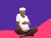 pregnant women holding her belly - stomach pain pregnancy