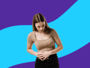 Woman holding right side of stomach: What causes right side stomach pain?