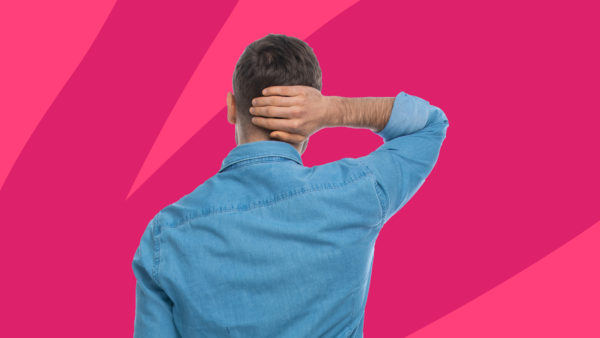 The back of a man with his hand on his head: What can cause a bump on the head?