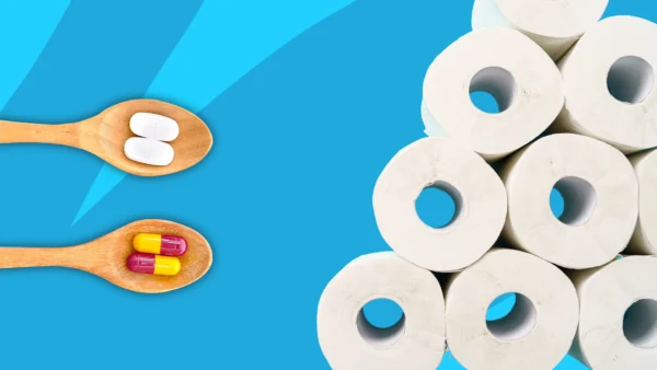 Image of toilet paper and probiotics capsules - do probiotics make you poop