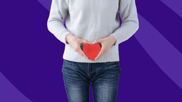 A female holding a heart over her pelvis: Home remedies for BV
