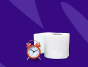 clock next to a toilet paper roll - best time to take miralax