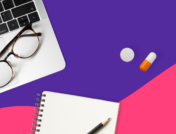 An open laptop with eyeglasses lying on it, a notepad, and a couple of pills: Does Medicare cover Ozempic?