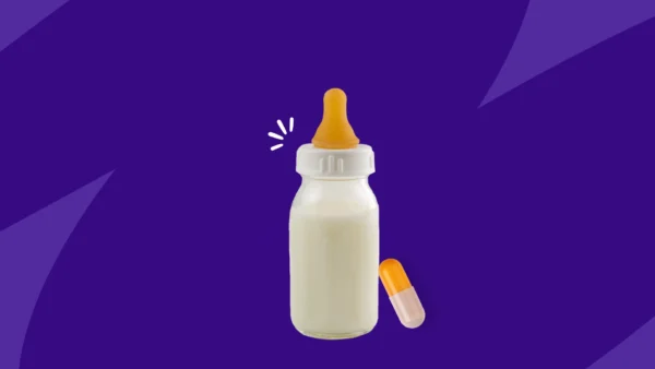 baby bottle next to a capsule - Adderall and breastfeeding