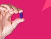 A hand holding a purple pill: How to save on Rinvoq