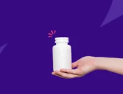 A hand holding an unlabled pill bottle: Can you buy metronidazole over the counter?
