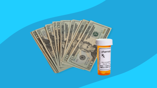 Some $20 bills and a prescription bottle: How to save on Trintellix: Savings card & more