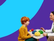 A child and a doctor at a table with sensory items: Guide to sensory-friendly doctor visits children with ASD