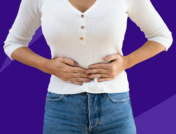 A woman with her hands on her stomach: Can you take Adderall on an empty stomach?