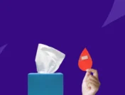 A box of tissues and drop of blood | Can stress cause nosebleeds?