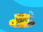 Cup of tea and flowers - calendula tea benefits