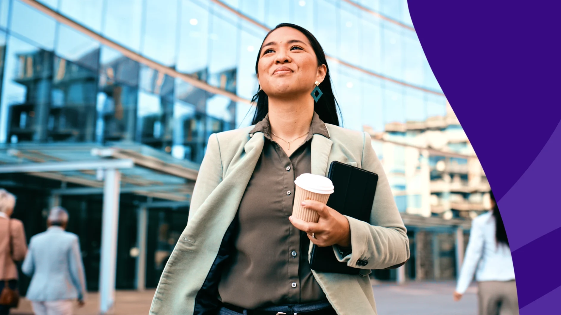 Person walking in a corporate area with a cup of coffee - Does Zepbound give you energy?