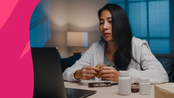 Person sitting at a desk - why take fenofibrate at night