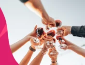 image of many people clinking wine glasses - aripiprazole and alcohol