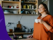 Woman holding a cup of coffee - Wegovy and coffee