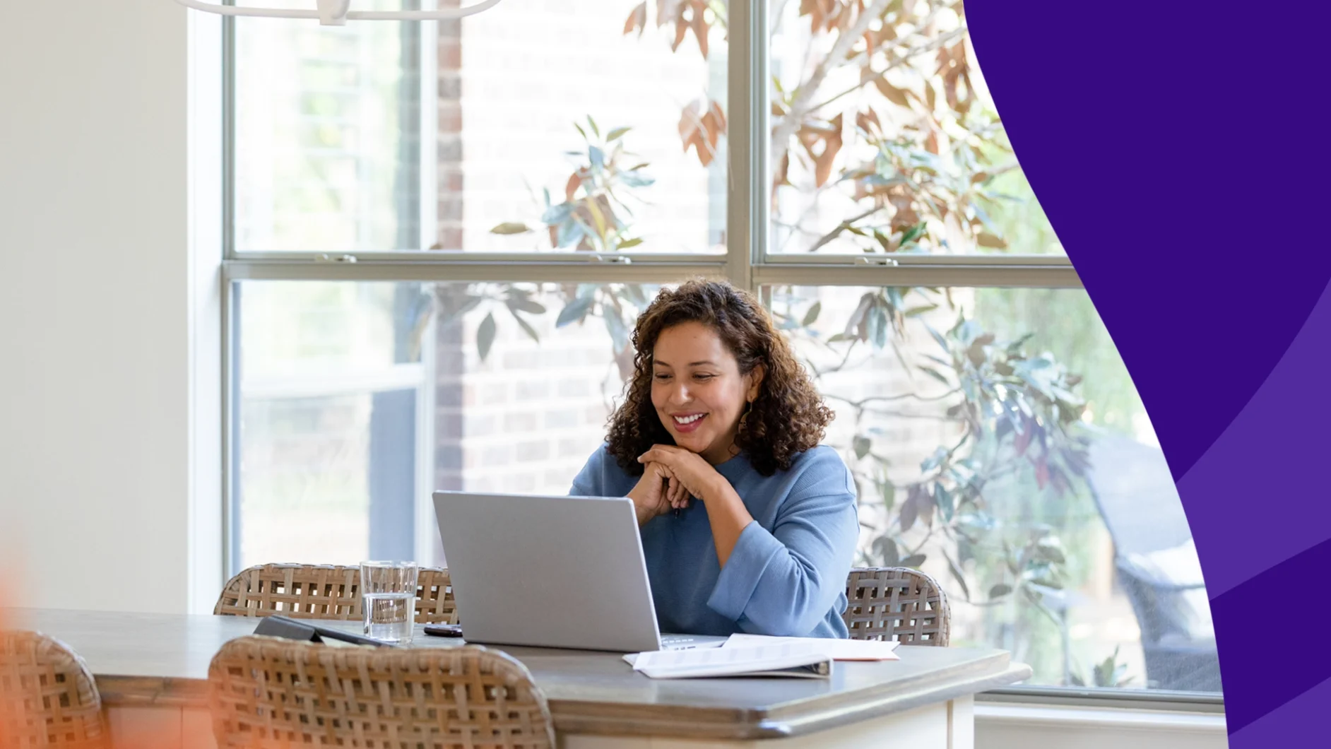 Image of a woman looking at her laptop - singlecare reviews