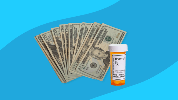 A prescription bottle with several $20 bills: Myrbetriq savings guide
