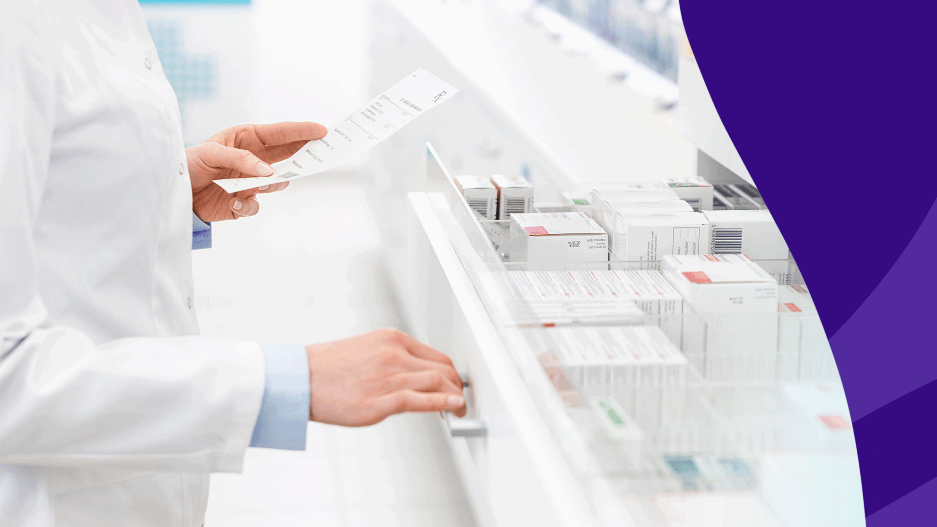 The hands of a pharmacist reading a prescription: How to transfer your prescription to another pharmacy