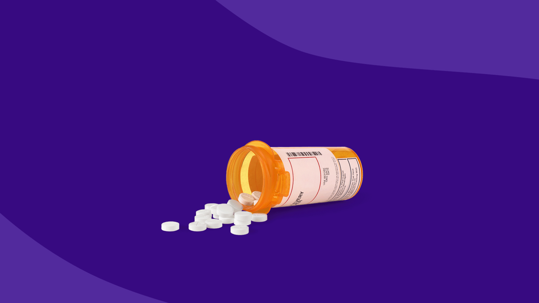 A prescription bottle with pills spilling out of it: Zofran generic