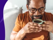 Man taking a sip of coffee - Can you drink coffee while taking Xarelto?