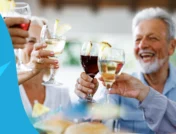 Group of people clinking glasses in a cheers - Jardiance and alcohol