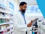 A pharmacist prepping for cold and flu season in the pharmacy