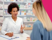 Pharmacist with a patient - help patients with CGM