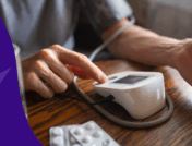 A person with a blood pressure cuff and pills | Does Jardiance lower blood pressure?