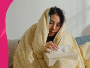 A woman with a box of tissues | doxycycline for sinus infection