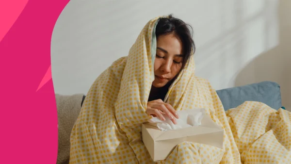 A woman with a box of tissues | doxycycline for sinus infection