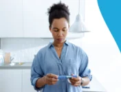 Woman looking at a Zepbound vial - How long does it take for zepbound to suppress appetite?