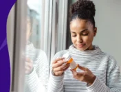 Person looking at a pill bottle - is prednisone an antibiotic