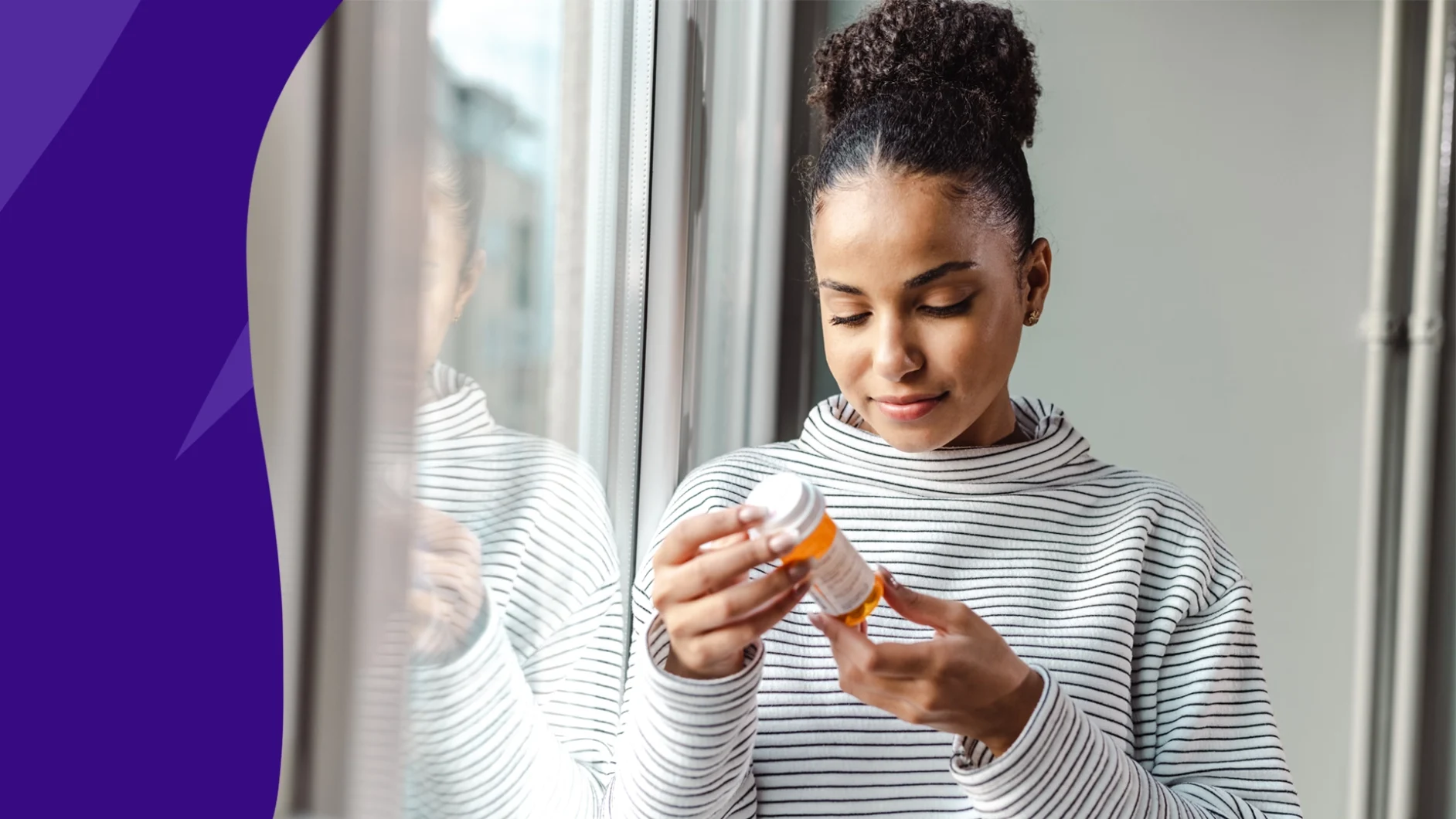 Person looking at a pill bottle - is prednisone an antibiotic