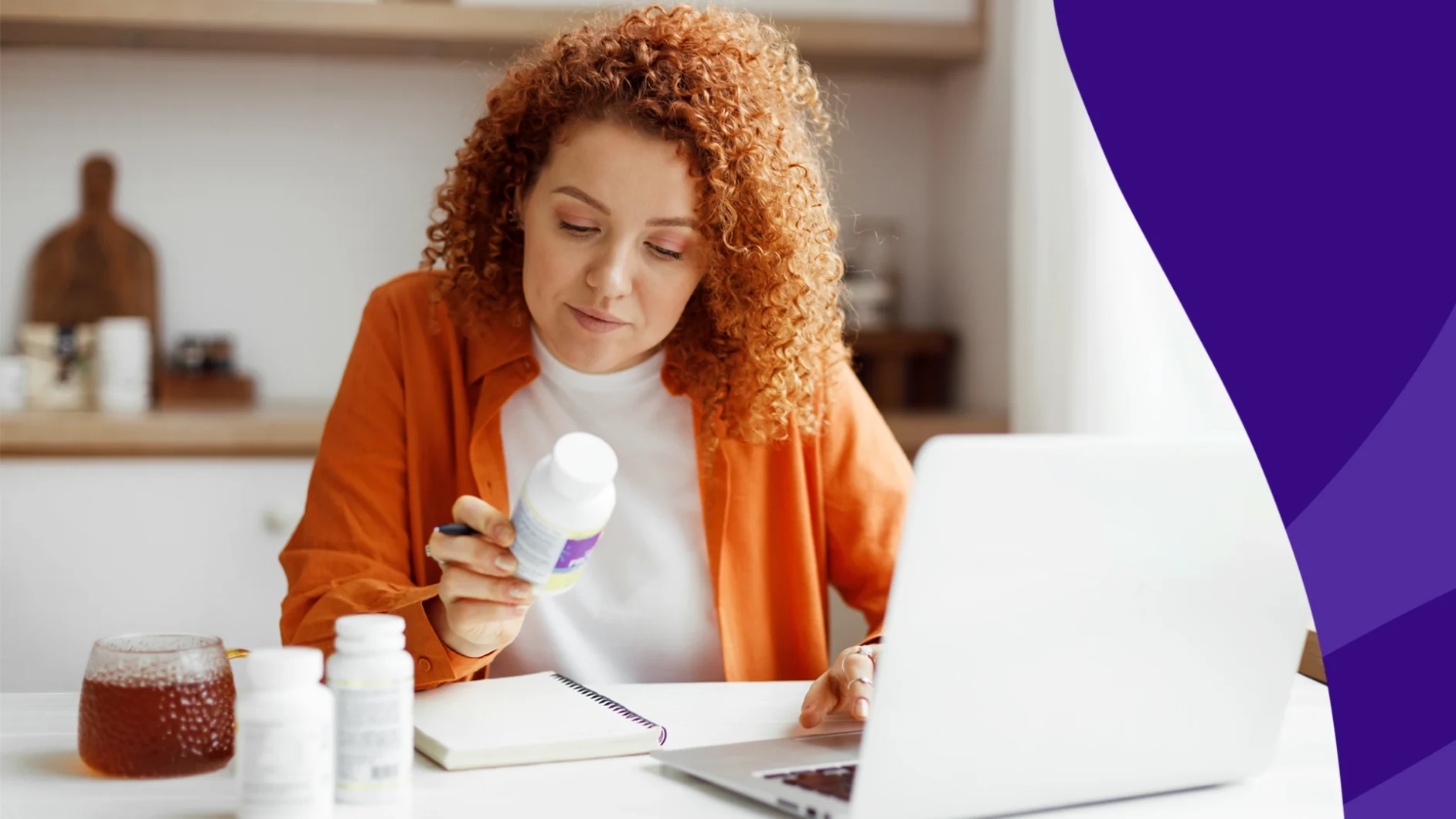 A woman looking at pill bottles | Medications that cause cold intolerance