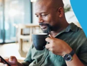 A man with a cup of coffee | Is coffee good for your liver?