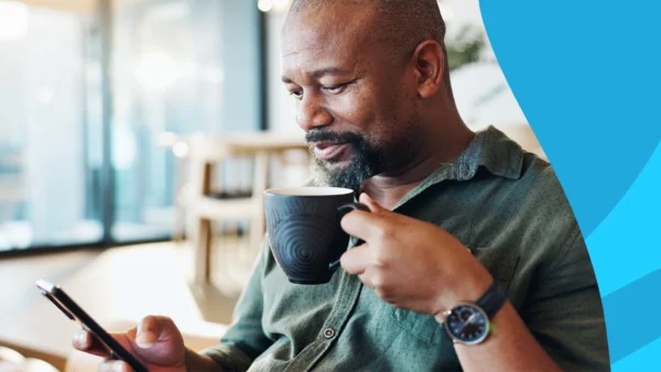 A man with a cup of coffee | Is coffee good for your liver?