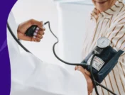 A person with a blood pressure cuff on | Can i take gabapentin with high blood pressure?