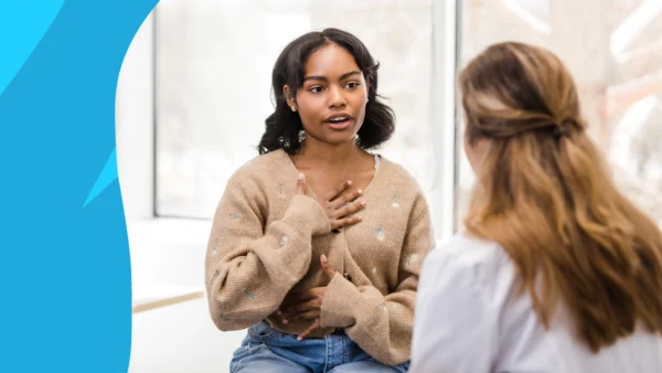 A woman talking to her provider | Will insurance cover Zepbound for sleep apnea?