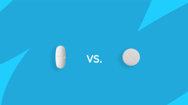 An oval pill and a round pill with "vs." between them: Buspirone vs. bupropion: Differences and similarities explained