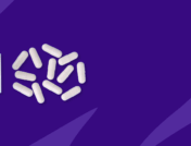 White capsules spilling out of a pill bottle: How much does Vraylar cost per month?