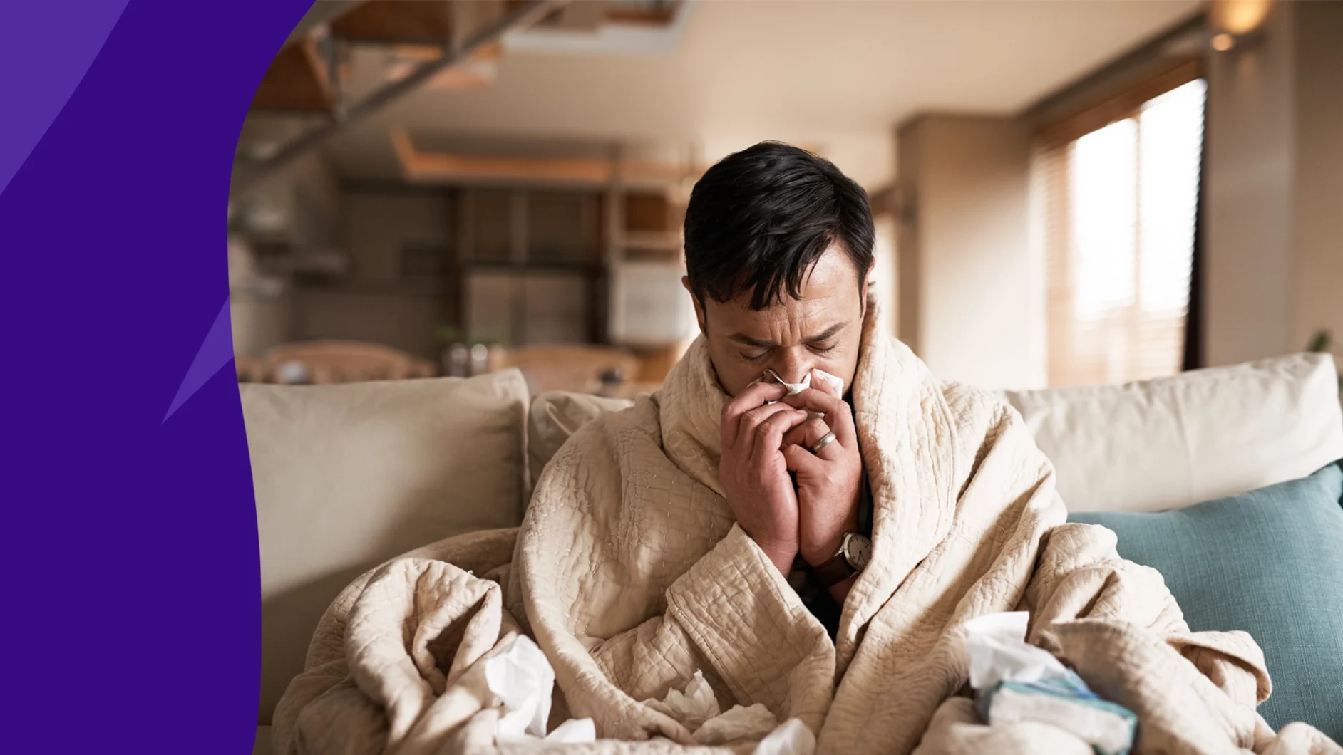 A man who is taking amoxicillin for sinus infection blowing his nose