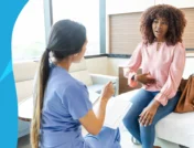 Person sitting down speaking with a provider about amitriptyline for IBS