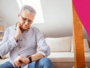 A man taking his pulse | What is an acceptable heart rate on beta blockers?