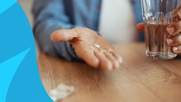 A man taking a pill | How long does tadalafil last?