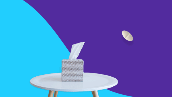 An oval tablet and a box of tissues on a table: Z-pak for flu