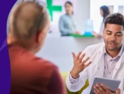 A pharmacist counseling a patient about ED treatment