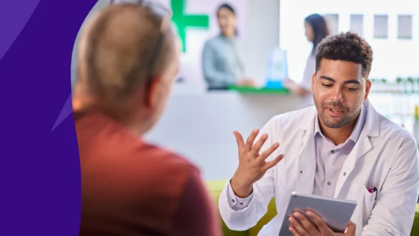 A pharmacist counseling a patient about ED treatment