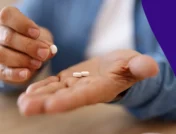 Hands holding pills - glp1-pills